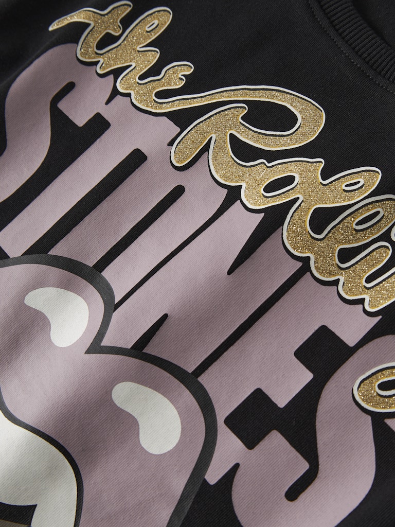 Topp Rolling Stones Suka Glitter Svart