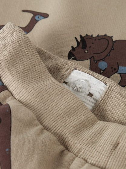 Sweatbyxor Dinosaurier Naris Beige