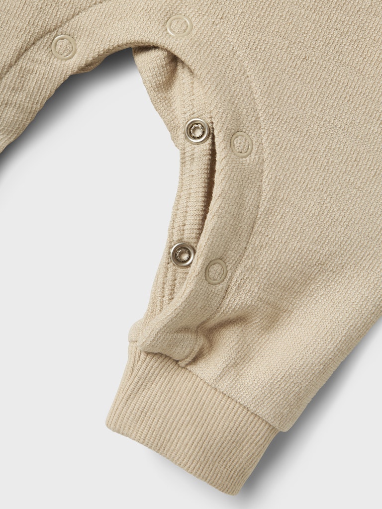 Hängselbyxa Loop Enfärgad Beige